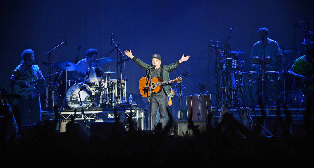 CENTRE STAGE: Paul Simon on the final night of Blues Festival in 2013 and, below, R.E.M. singer Michael Stipe. CENTRE STAGE: Paul Simon on the final night of Blues Festival in 2013 and, below, R.E.M. singer Michael Stipe.